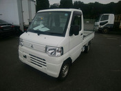 It is a picture of the white mitsubishi minicab  truck in 2012,First Photo Stock No.Y057832