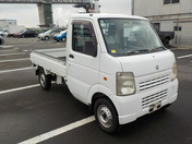 It is a picture of the white suzuki carry  truck in 2010,First Photo Stock No.Y058190