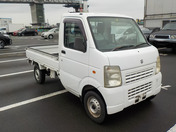 It is a picture of the white suzuki carry  truck in 2011,First Photo Stock No.Y058257