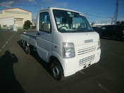 It is a picture of the white suzuki carry  truck in 2005,First Photo Stock No.Y058881