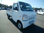 It is a picture of the white suzuki carry  truck in 2010,First Photo Stock No.Y058897