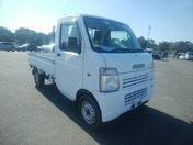 It is a picture of the white suzuki carry  truck in 2009,First Photo Stock No.Y058946